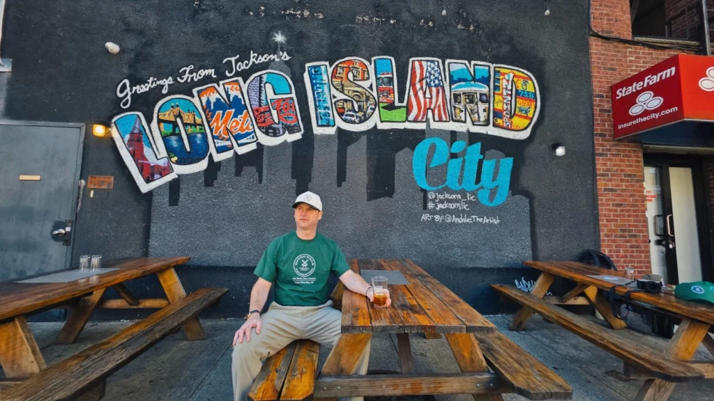 Alex, founder of Dutch Kills Foundation, in front of the Long Island City mural